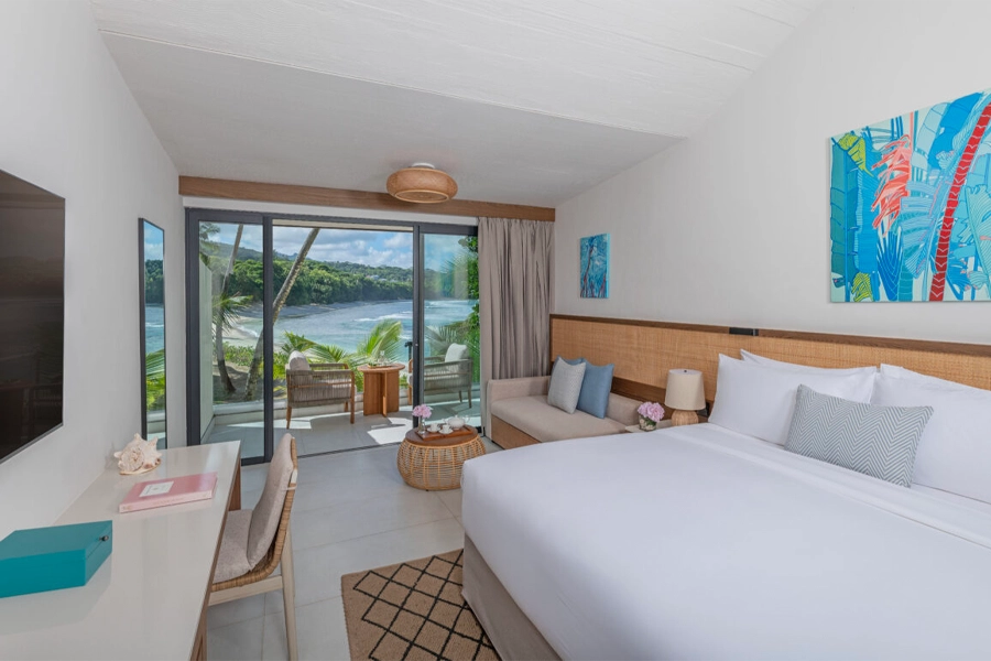 Avani+ Barbarons Seychelles Resort guest room interior.